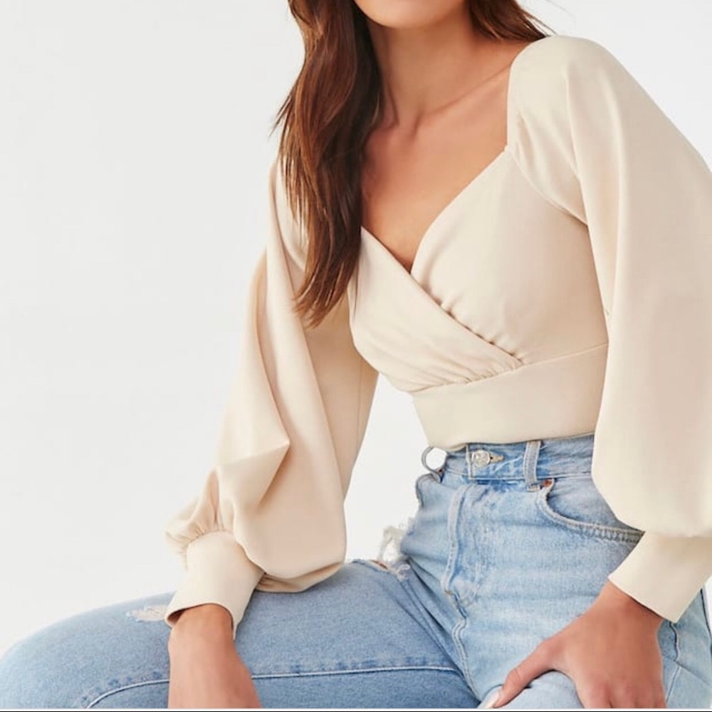 NWT. Long sleeve bodysuit.